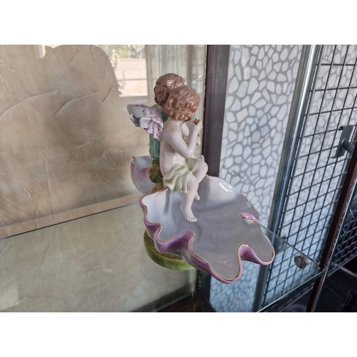 Centro de mesa duplo em porcelana Richard Eckert Volkstedt, putti músicos e conchas, início do século XX