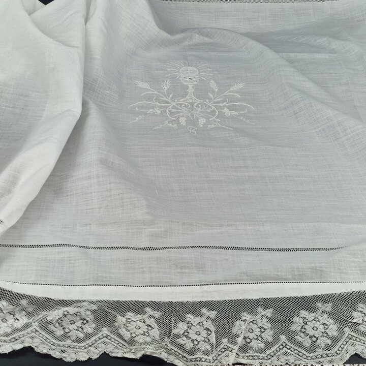 Antique embroidery Handmade religious embroidery - White embroidery is an antique cloth for baptism or first communion.