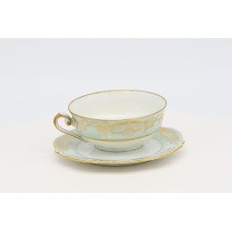 Limoges Cenpor theekop en schotel, circa 1910