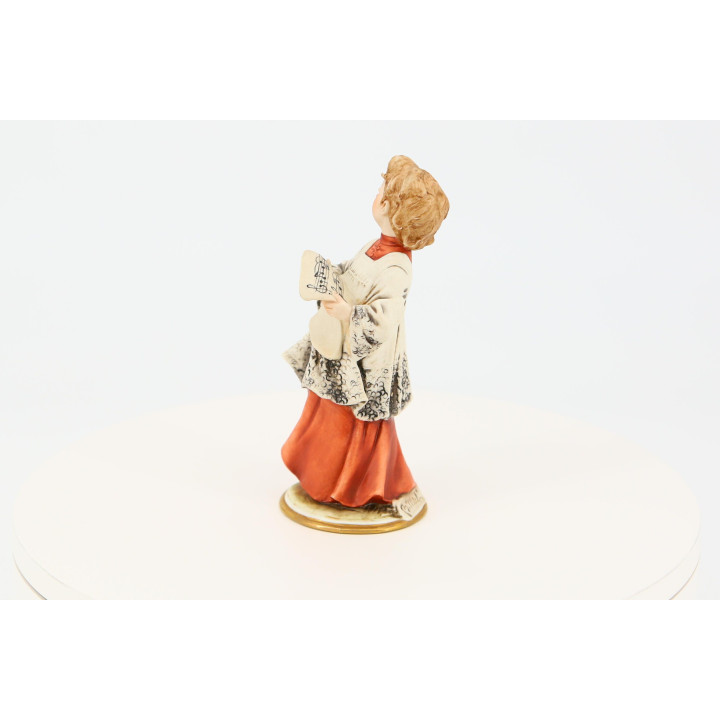 Capodimonte Porzellanfigur B. Merli: Singender Junge, Italien
