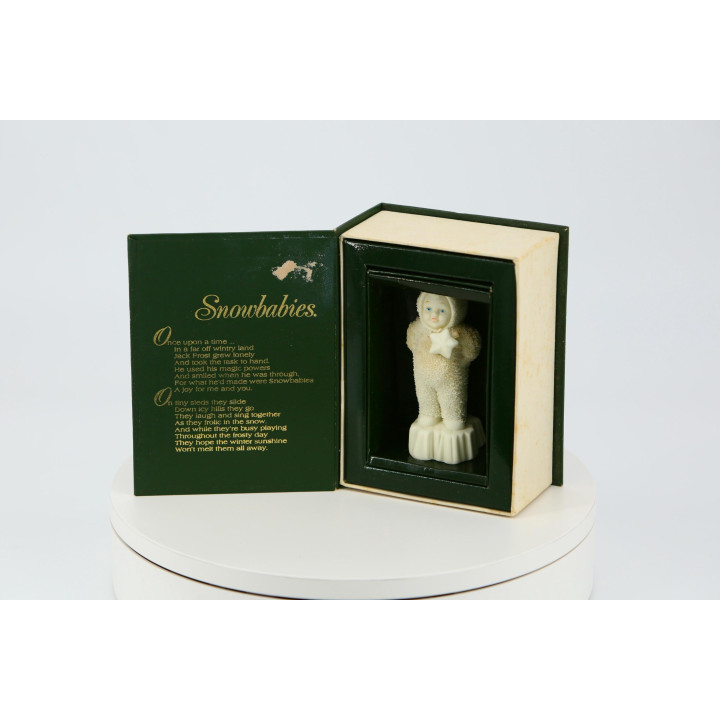 Figurka Snowbabies Goebel Dept 56 - Gwiazda lata 90.