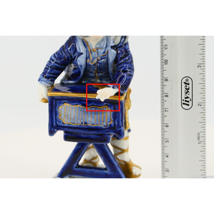 Figurine en porcelaine Volkstedt Joueur d'orgue