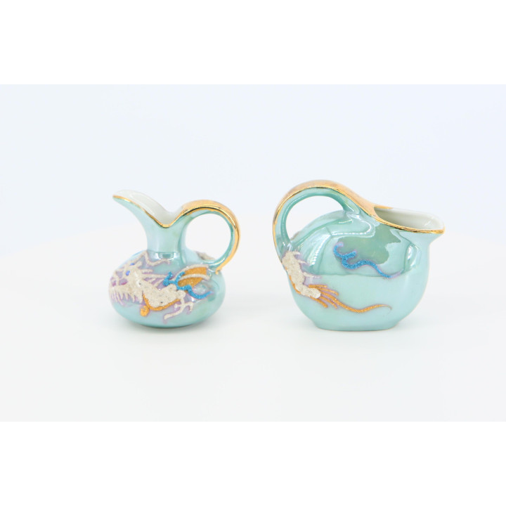 Pareja de Jarras Nakasima - Porcelana Moriage Japonesa 1930