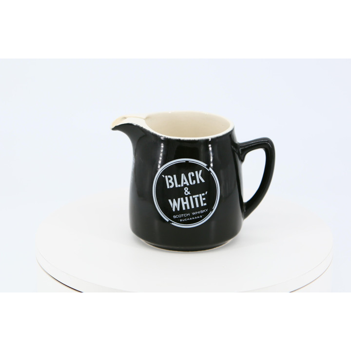 Black & White Whisky Kan, Arthur Wood, jaren 30